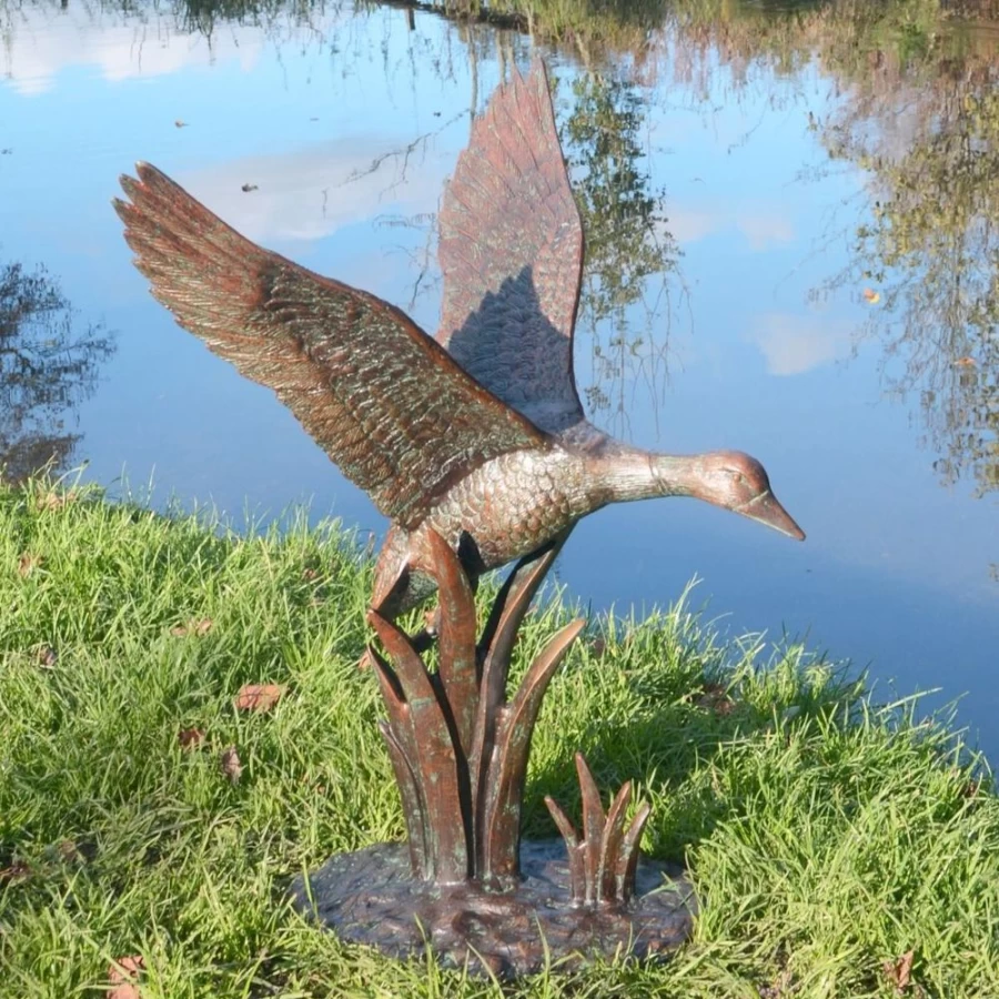 "STATUES & SCULPTURES Flying Duck Bronze Garden Statue - Handcrafted Metal Outdoor Decor"