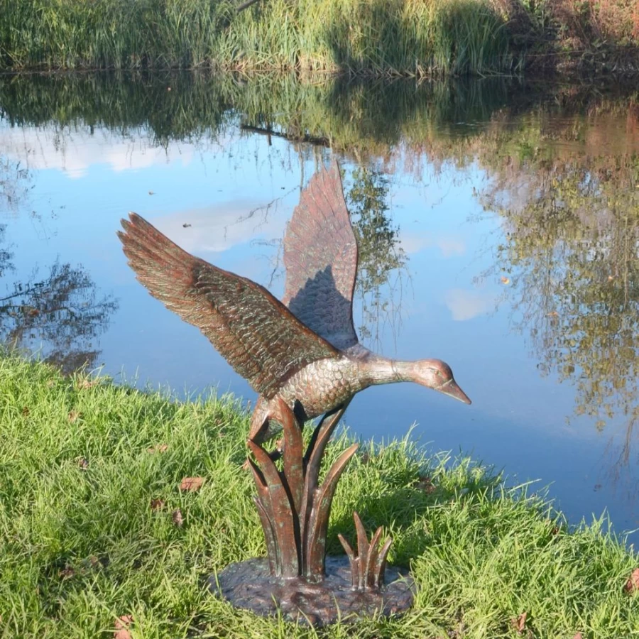 "STATUES & SCULPTURES Flying Duck Bronze Garden Statue - Handcrafted Metal Outdoor Decor"