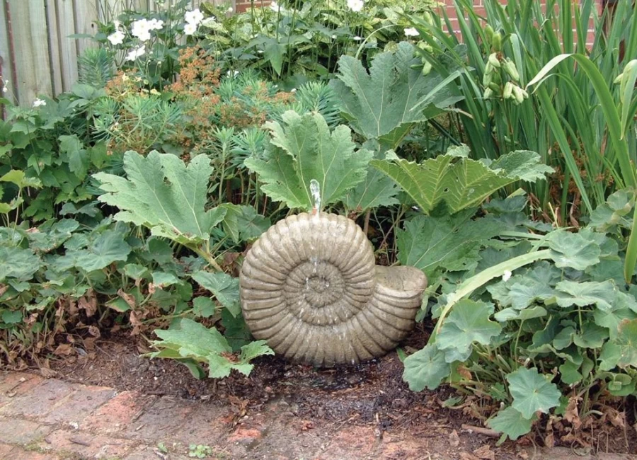 "Grand Ammonite Fossil Stone Outdoor Water Feature – Natural Garden Sculpture by STATUES & SCULPTURES"