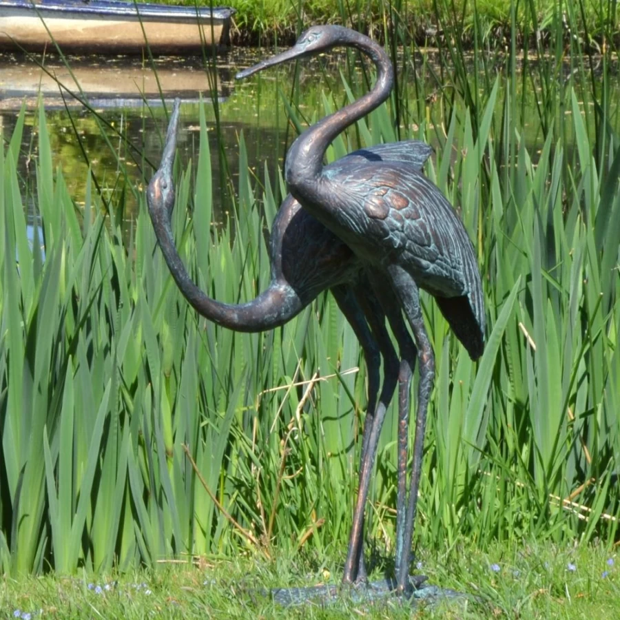 "Aged Bronze Love Cranes Garden Statue – Elegant Outdoor Sculpture by STATUES & SCULPTURES"