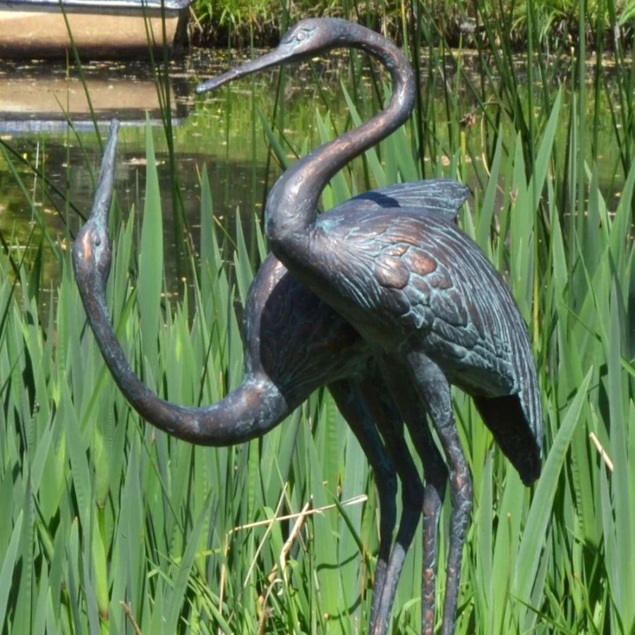 "Aged Bronze Love Cranes Garden Statue – Elegant Outdoor Sculpture by STATUES & SCULPTURES"
