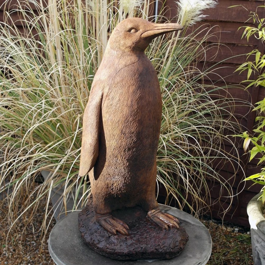 "Monty The Penguin Rusty Garden Statue – Vintage Stone Sculpture by STATUES & SCULPTURES"
